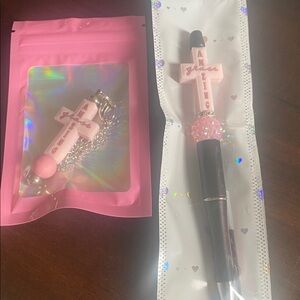 Pink Cross Keychain with Silver Chain and Pen.
